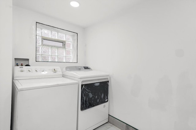 5019 N Kostner Ave, Chicago, IL 60630 - laundry room featuring washer and dryer and light marble finish flooring