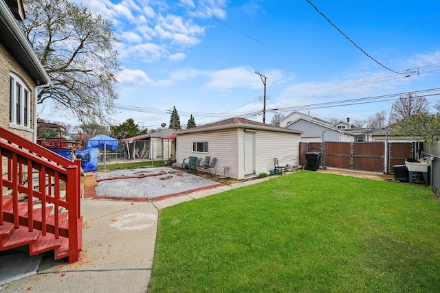5019 N Kostner Ave, Chicago, IL 60630 - fenced backyard featuring an outbuilding and a patio area