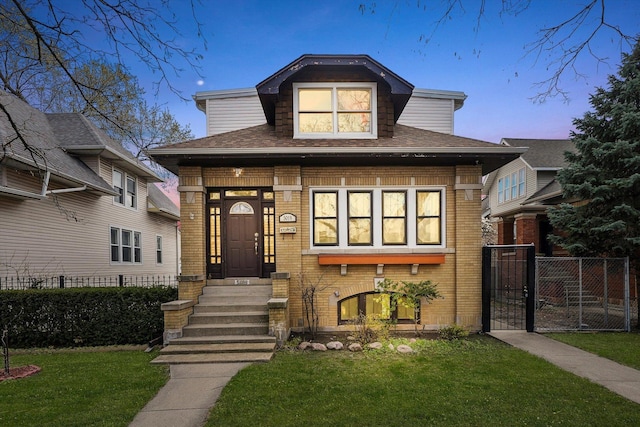5019 N Kostner Ave, Chicago, IL 60630 - bungalow with brick siding and a shingled roof