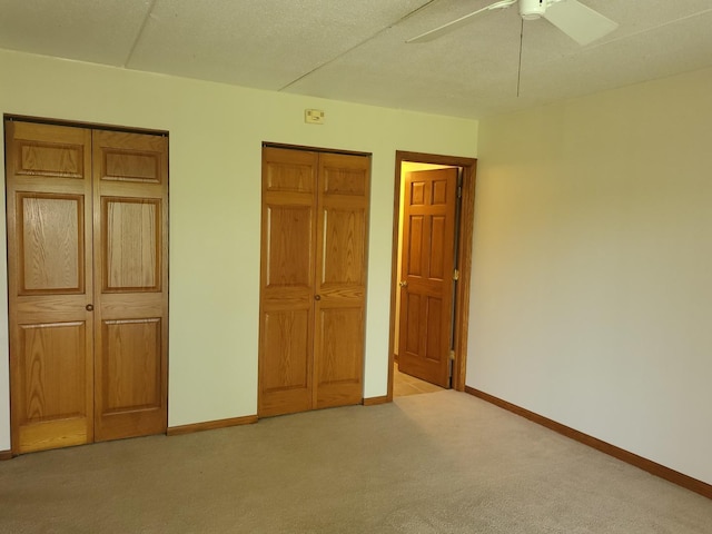 505 Redondo Dr Unit 108, Downers Grove, IL 60515 - unfurnished bedroom featuring carpet floors and ceiling fan