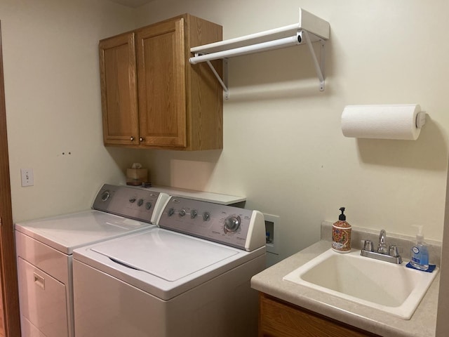 831 Oriole Dr, Peotone, IL 60468 - laundry room featuring separate washer and dryer and cabinet space