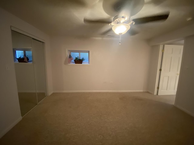 831 Oriole Dr, Peotone, IL 60468 - empty room with carpet floors and a ceiling fan