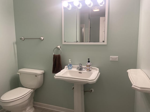 831 Oriole Dr, Peotone, IL 60468 - bathroom featuring toilet and tile patterned floors