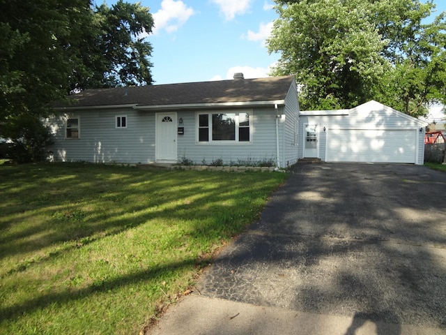 210 Caddy Ave, Carpentersville, IL 60110 - single story home with asphalt driveway, a front yard, and a chimney