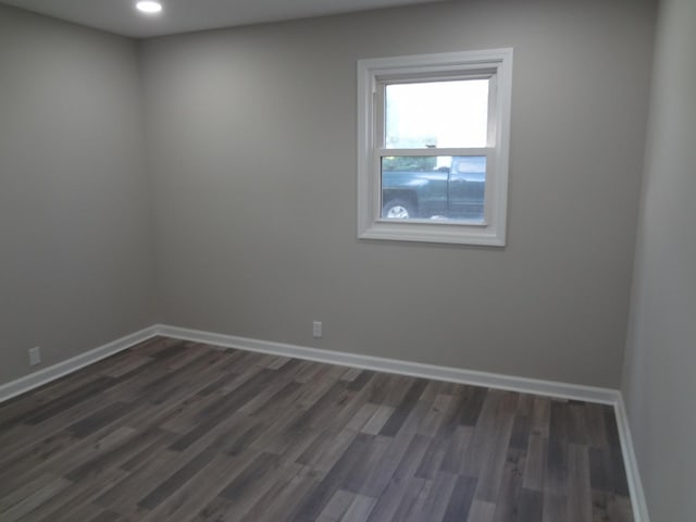 210 Caddy Ave, Carpentersville, IL 60110 - unfurnished room with dark wood-type flooring and recessed lighting