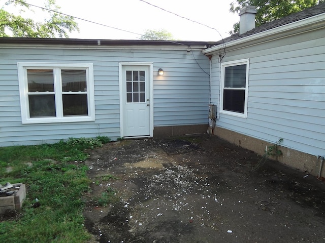 210 Caddy Ave, Carpentersville, IL 60110 - entrance to property featuring a chimney