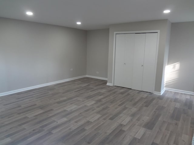 210 Caddy Ave, Carpentersville, IL 60110 - unfurnished bedroom featuring wood finished floors, recessed lighting, and a closet