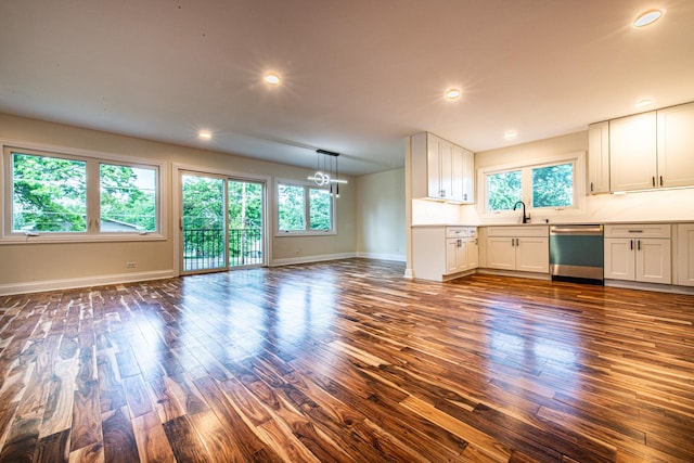 1665 Highland Blvd, Hoffman Estates, IL 60169 - unfurnished living room with dark wood-type flooring, a chandelier, and recessed lighting