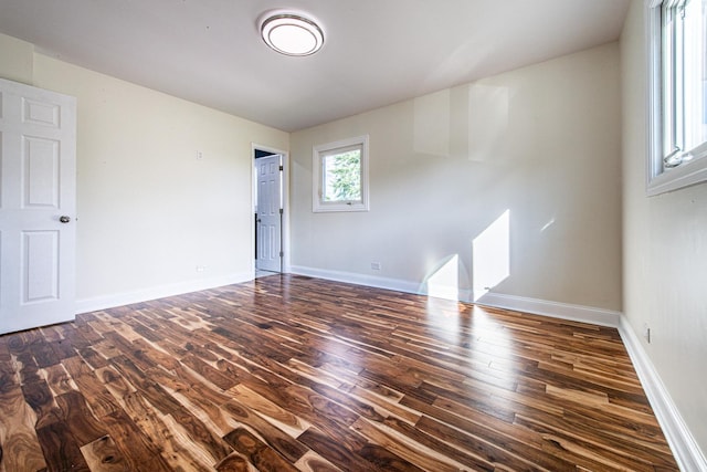 1665 Highland Blvd, Hoffman Estates, IL 60169 - spare room featuring dark wood-style flooring and baseboards