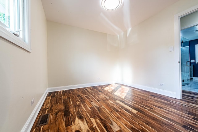 1665 Highland Blvd, Hoffman Estates, IL 60169 - unfurnished room featuring dark wood-style floors