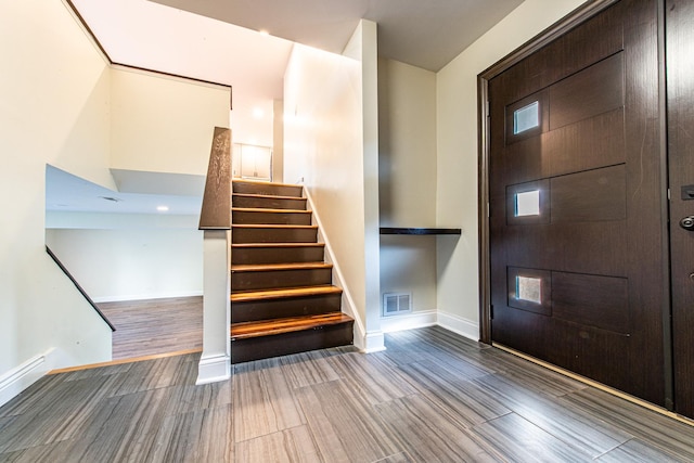 1665 Highland Blvd, Hoffman Estates, IL 60169 - foyer featuring stairs and wood finished floors