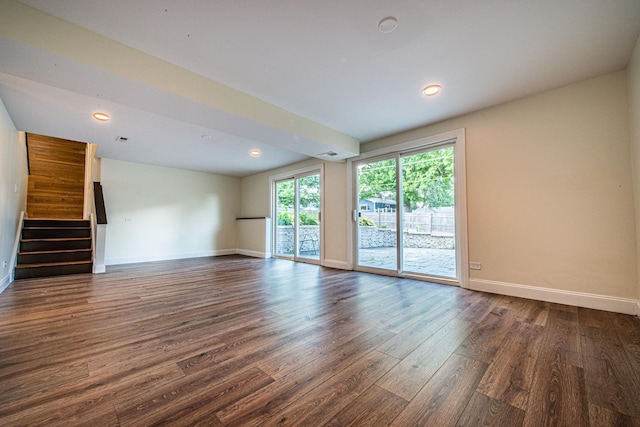1665 Highland Blvd, Hoffman Estates, IL 60169 - unfurnished living room featuring dark wood finished floors, stairway, and recessed lighting