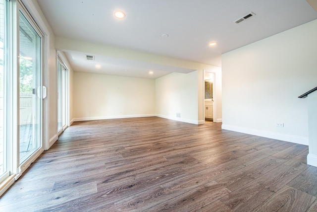 1665 Highland Blvd, Hoffman Estates, IL 60169 - unfurnished room with plenty of natural light, wood finished floors, and recessed lighting