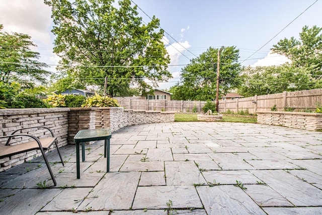 1665 Highland Blvd, Hoffman Estates, IL 60169 - fenced backyard featuring a patio area