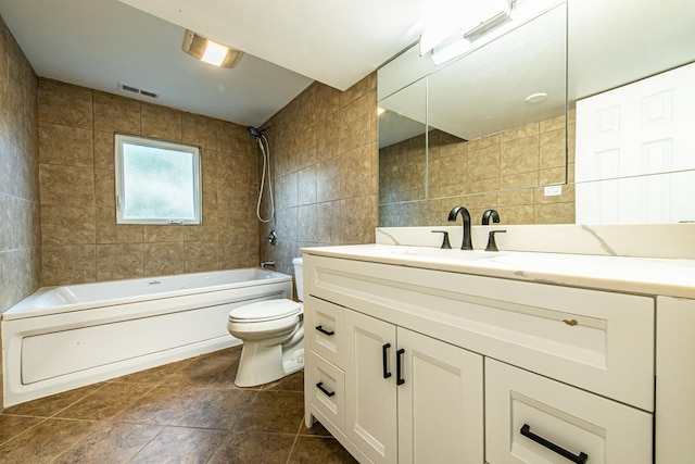 1665 Highland Blvd, Hoffman Estates, IL 60169 - bathroom with tile walls, vanity, washtub / shower combination, and tile patterned floors