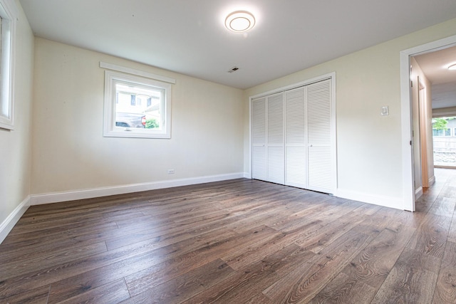 1665 Highland Blvd, Hoffman Estates, IL 60169 - unfurnished bedroom with wood finished floors and a closet