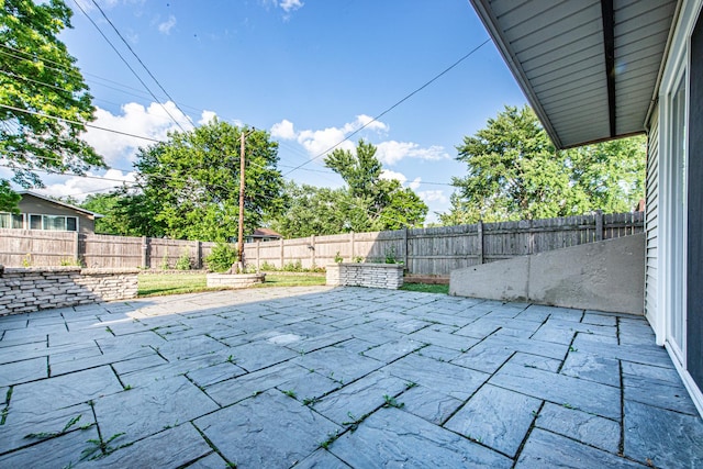 1665 Highland Blvd, Hoffman Estates, IL 60169 - fenced backyard featuring a patio