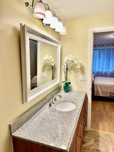 2317 N Neva Ave Unit 106A, Chicago, IL 60707 - bathroom with ensuite bathroom and vanity