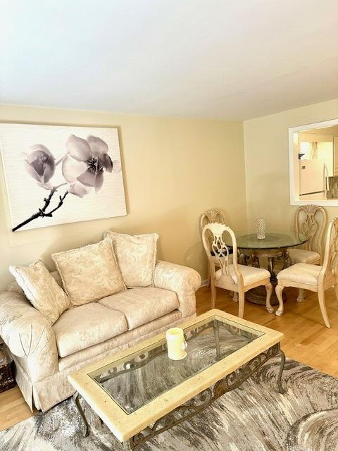 2317 N Neva Ave Unit 106A, Chicago, IL 60707 - living area featuring wood finished floors