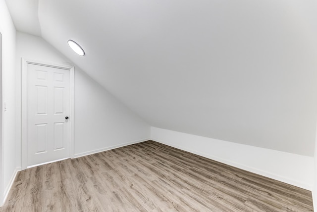 8109 S Marquette Ave, Chicago, IL 60617 - additional living space with vaulted ceiling and wood finished floors