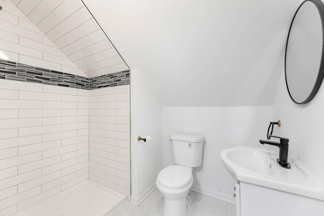 8109 S Marquette Ave, Chicago, IL 60617 - full bathroom featuring vaulted ceiling, vanity, a tile shower, and marble look tile flooring