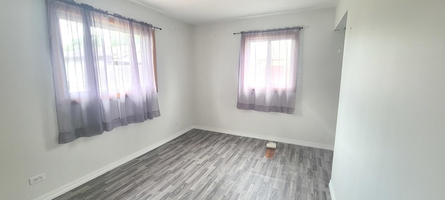 9236 Stanford Dr S, Bridgeview, IL 60455 - empty room featuring wood finished floors and baseboards