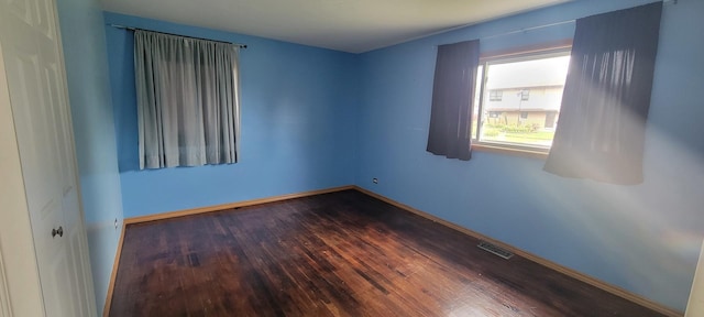 9236 Stanford Dr S, Bridgeview, IL 60455 - empty room with wood finished floors and baseboards