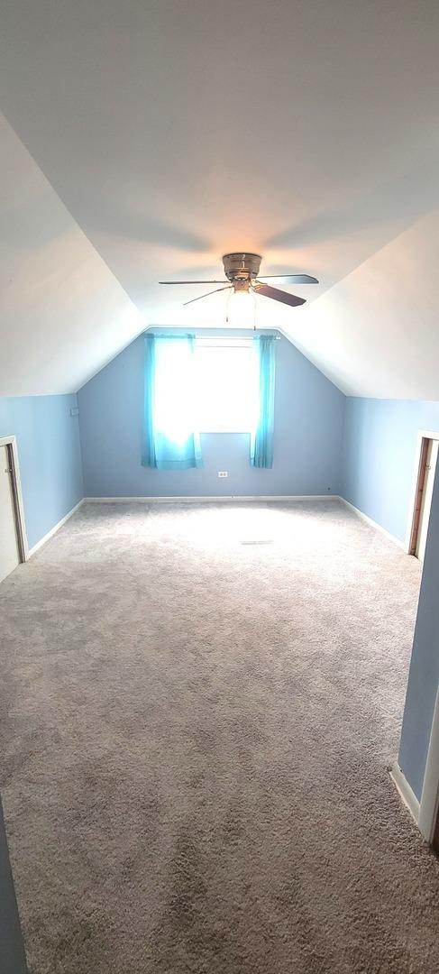 9236 Stanford Dr S, Bridgeview, IL 60455 - bonus room with lofted ceiling, carpet flooring, and ceiling fan