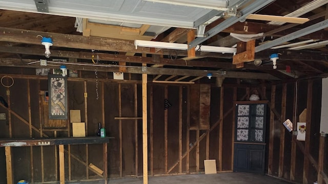 302 Dee Rd, North Aurora, IL 60542 - miscellaneous room with concrete flooring and a garage