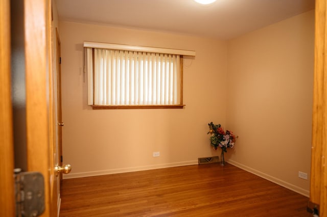 9404 Hamlin Ave, Des Plaines, IL 60016 - spare room with wood finished floors and baseboards