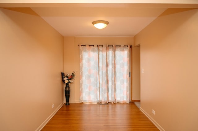 9404 Hamlin Ave, Des Plaines, IL 60016 - unfurnished room with wood finished floors