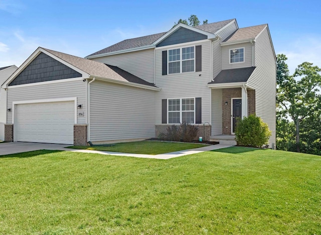 11936 Montgomery St, Winfield, IN 46307 - view of front of house with an attached garage, brick siding, a front yard, and concrete driveway