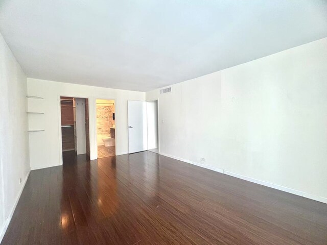 6033 N Sheridan Rd Unit 27C, Chicago, IL 60660 - unfurnished bedroom with wood finished floors and baseboards