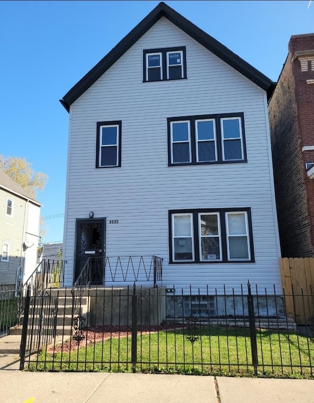 6639 S Sangamon St, Chicago, IL 60621 - view of front facade featuring a fenced front yard