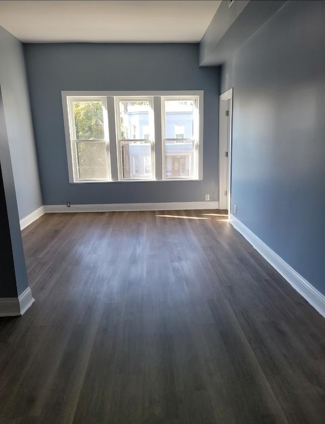 6639 S Sangamon St, Chicago, IL 60621 - spare room with dark wood-type flooring and baseboards