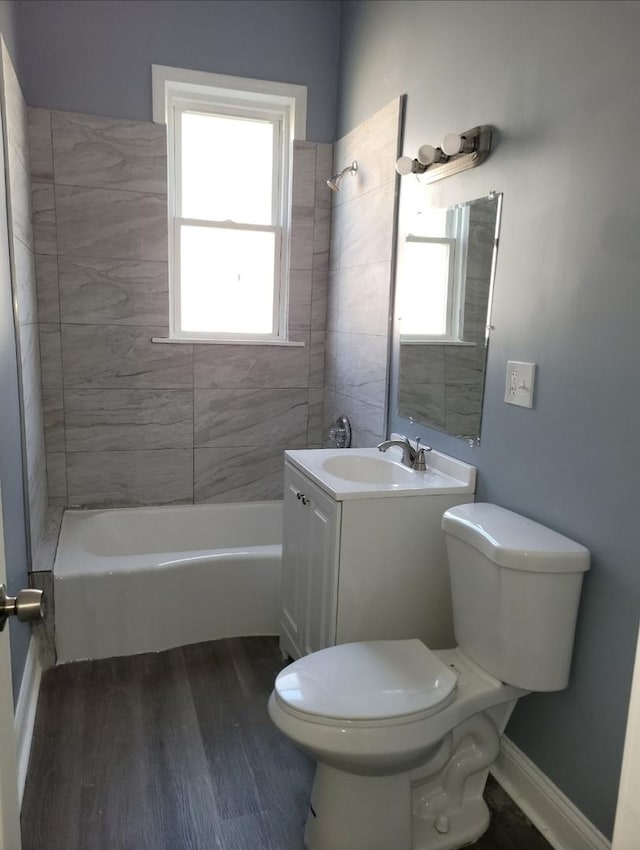 6639 S Sangamon St, Chicago, IL 60621 - full bathroom with vanity, shower / bath combination, and wood finished floors