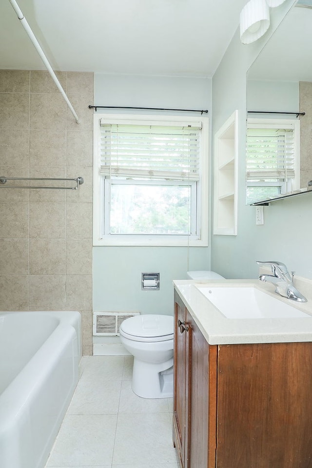950 Pennsylvania Ave, Aurora, IL 60506 - full bath with vanity, tile patterned flooring, and  shower combination