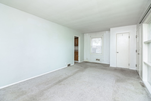 950 Pennsylvania Ave, Aurora, IL 60506 - carpeted spare room with baseboards
