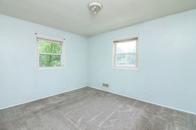 950 Pennsylvania Ave, Aurora, IL 60506 - spare room with carpet flooring and baseboards