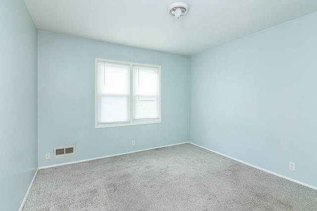 950 Pennsylvania Ave, Aurora, IL 60506 - empty room with carpet flooring