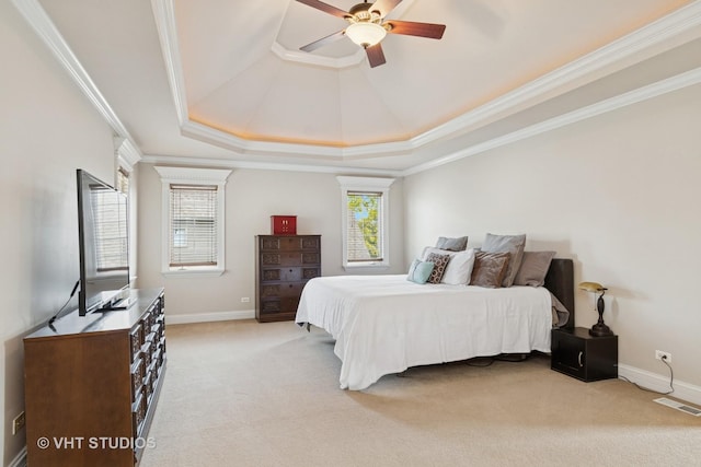 12840 Shenandoah Trl, Plainfield, IL 60585 - bedroom with a tray ceiling, ornamental molding, light colored carpet, and a ceiling fan