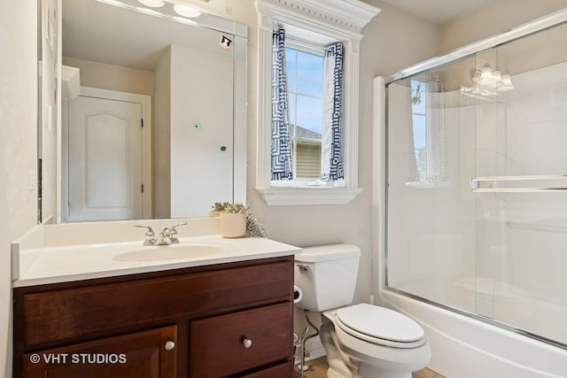 12840 Shenandoah Trl, Plainfield, IL 60585 - full bath with vanity and shower / bath combination with glass door