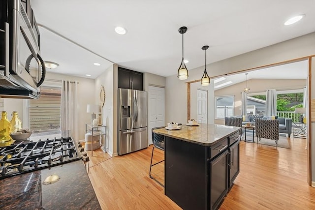 636 N Greenview Ave, Mundelein, IL 60060 - kitchen with stainless steel appliances, light wood-style flooring, dark cabinetry, pendant lighting, and recessed lighting