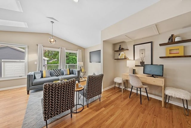 636 N Greenview Ave, Mundelein, IL 60060 - living room featuring light wood finished floors, lofted ceiling, a skylight, and a desk