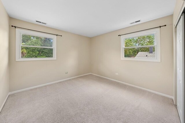 636 N Greenview Ave, Mundelein, IL 60060 - carpeted spare room featuring baseboards