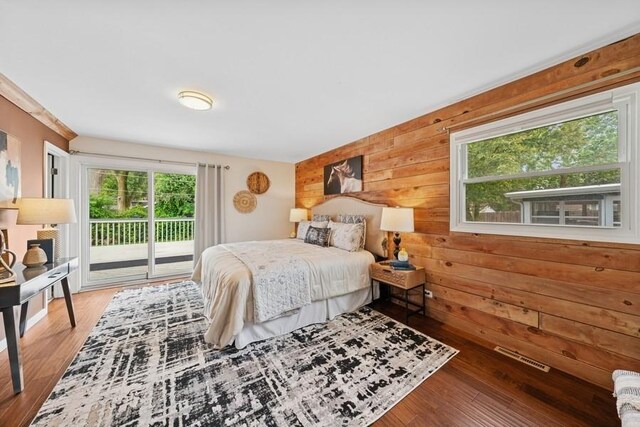 636 N Greenview Ave, Mundelein, IL 60060 - bedroom featuring access to outside, wood walls, and wood finished floors