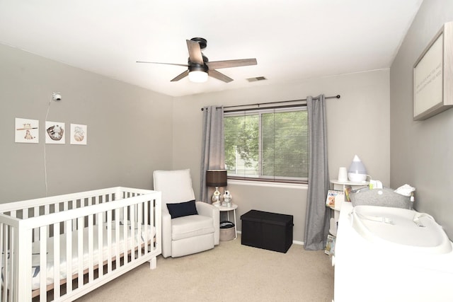 1620 Hadley Ct Unit A2, Wheeling, IL 60090 - carpeted bedroom featuring a crib and a ceiling fan
