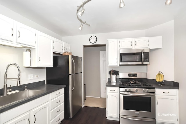 1620 Hadley Ct Unit A2, Wheeling, IL 60090 - kitchen with stainless steel appliances, dark countertops, and white cabinetry