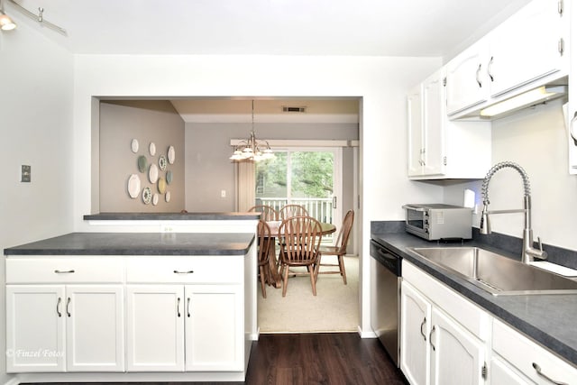 1620 Hadley Ct Unit A2, Wheeling, IL 60090 - kitchen with dark countertops, dishwasher, white cabinets, dark wood-style flooring, and a chandelier