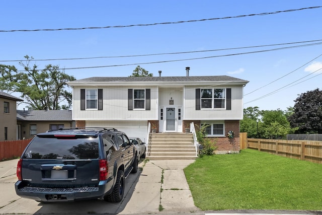 10302 W Palmer Ave, Melrose Park, IL 60164 - raised ranch with brick siding, a garage, and concrete driveway